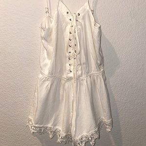 Off white, ties in the front.